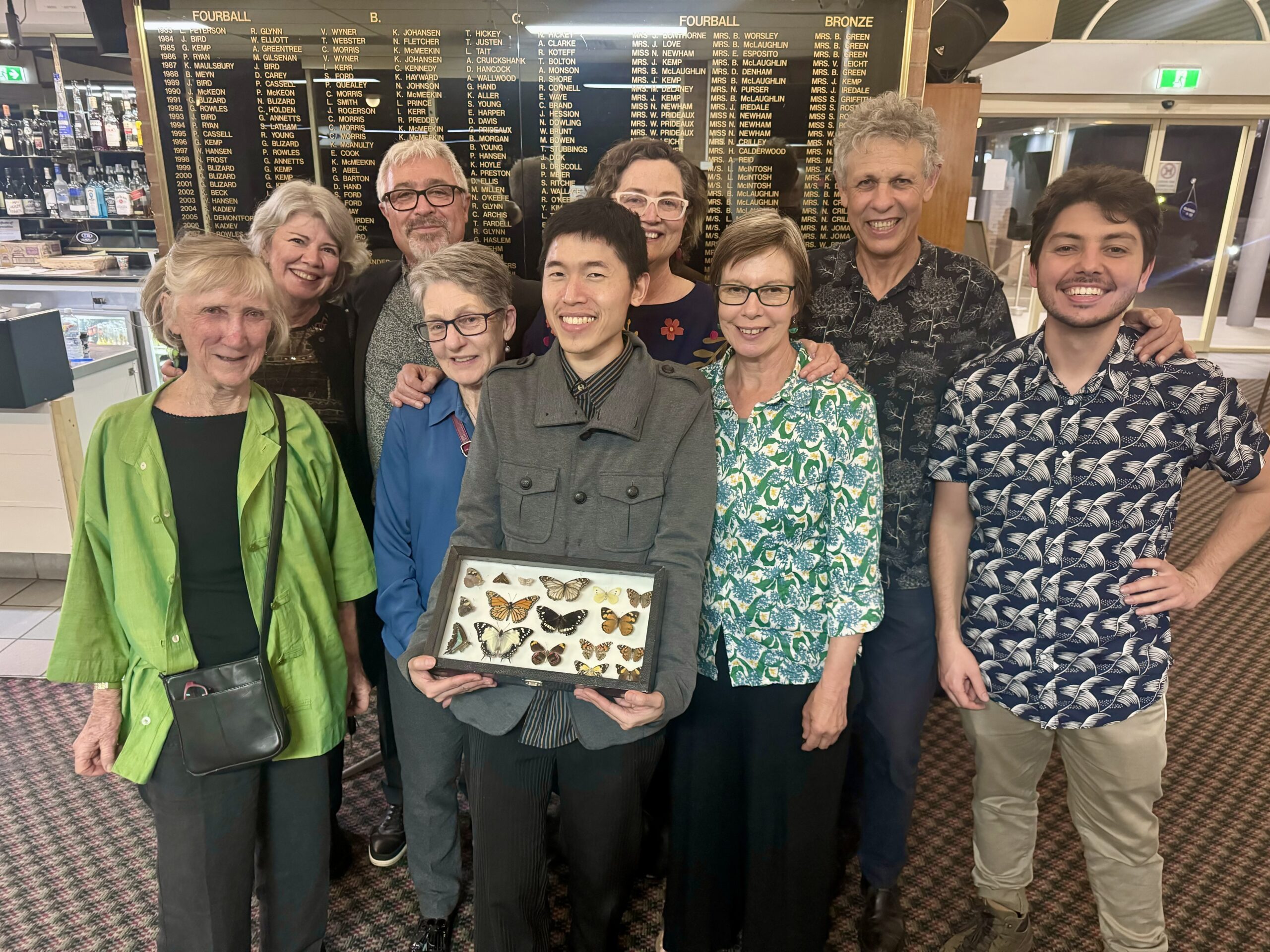 Dinner organisers smile for camera