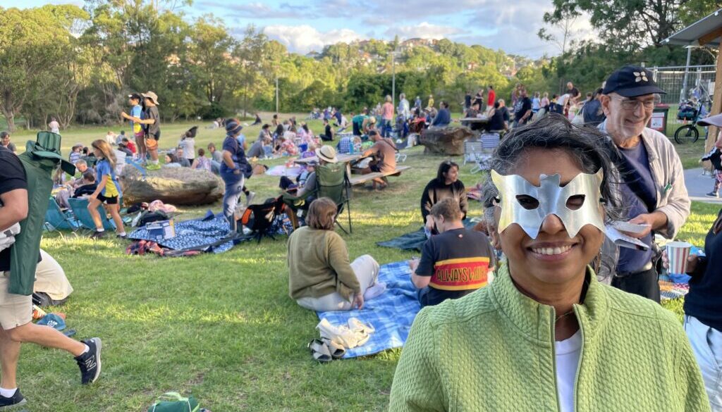 woman in mask at picnic