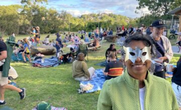 woman in mask at picnic